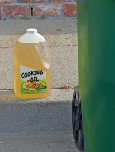 cooking oil next to ORG cart